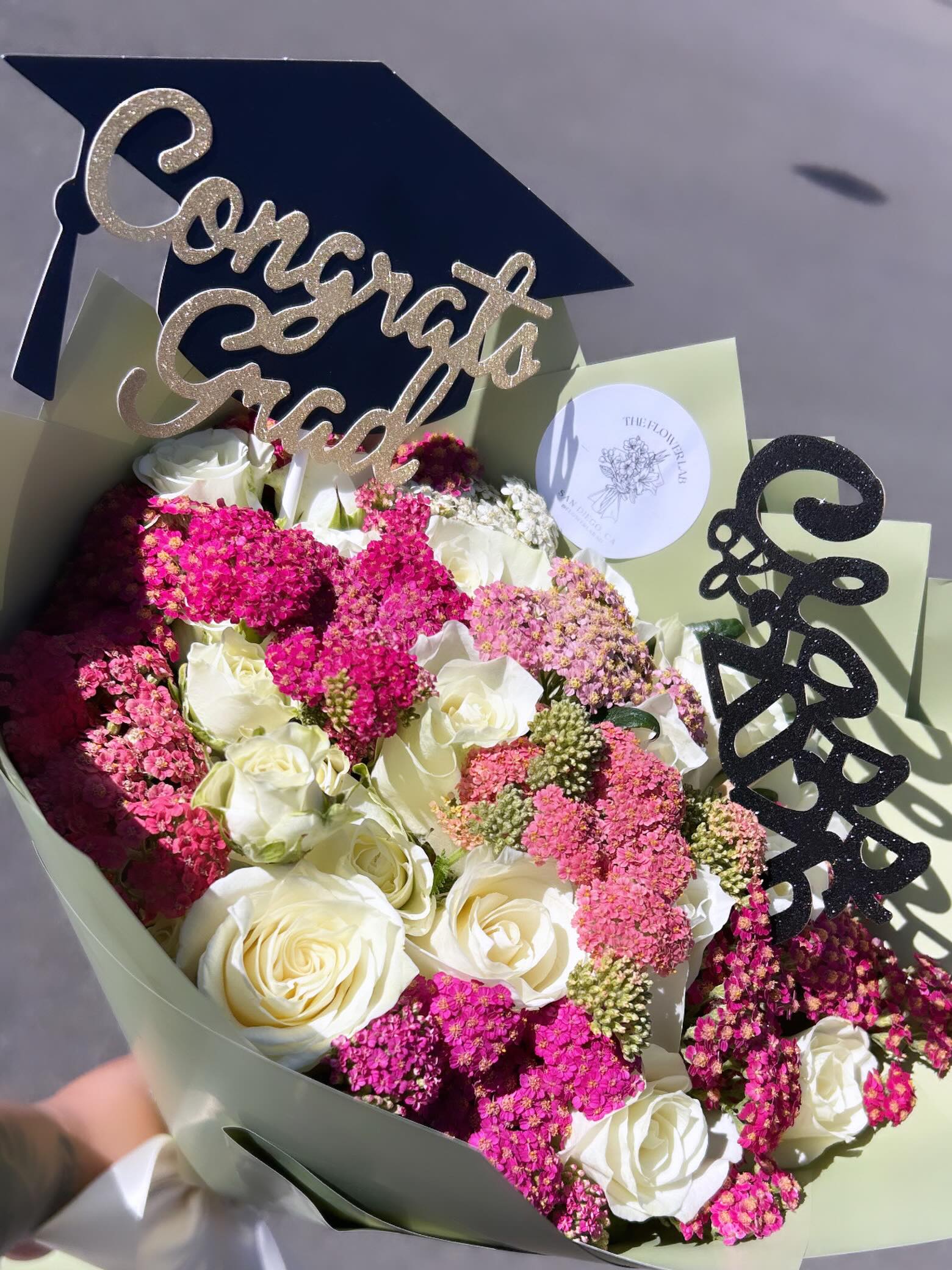 Florist holding custom bouquet